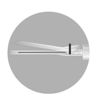 Side view of a syringe with a thin needle and a black plunger moved toward the tip on a gray, circular background