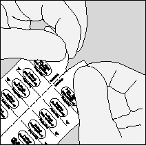 Mani che separano un blister con compresse staccando la linea perforata che divide le file di farmaci
