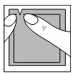 Two hands tearing apart a square packaging element by pulling at the notch at the top to open the product's safety seal