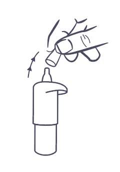Hand holding a vial of medication, placing it onto the upper part of the device at the angle indicated by the arrow