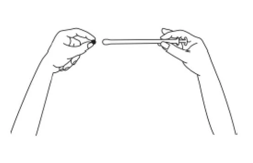 Two hands holding horizontally a long, thin syringe with a rounded tip, preparing it for use or medication administration