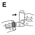 Two hands holding a white medical device, one hand sliding a component to the right according to the arrow to connect parts of the device