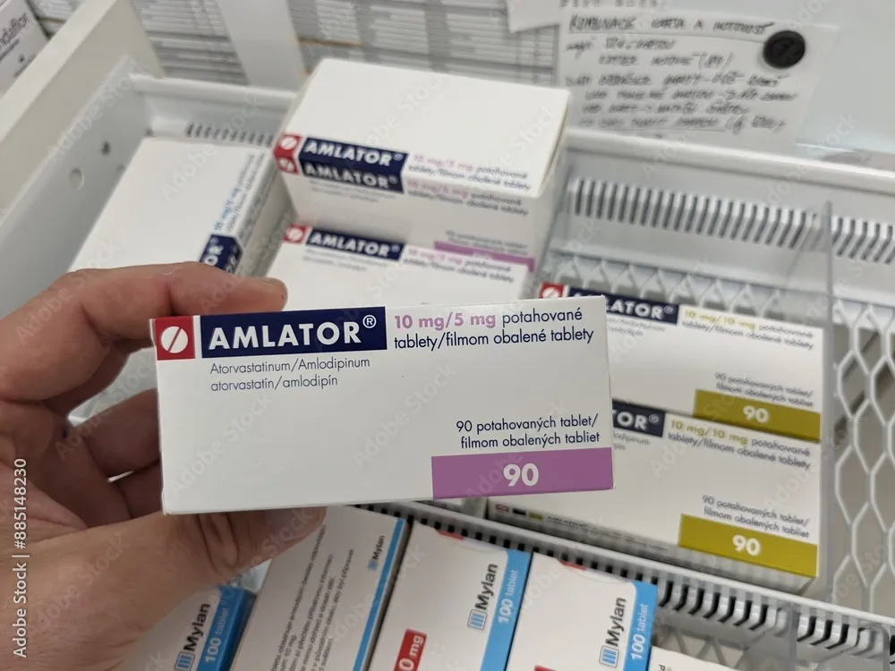 Amlator compresse, rivestite con film