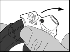 A hand holding an inhaler, pressing a button with an arrow indicating a turning motion to activate the medication dose