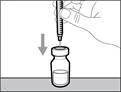 Hand holding a syringe, inserting the needle into a test tube with liquid, arrow indicating downward direction to draw the solution