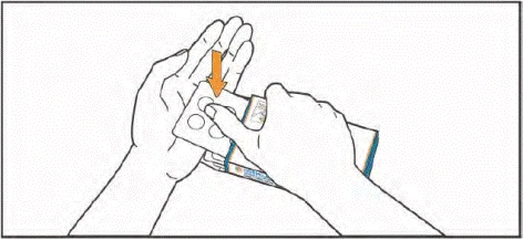 One hand holding the tablet blister pack, the other pressing one of the tablets to push it out of the packaging, with an arrow indicating the direction of pressure