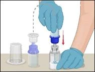 Hand in blue glove inserting the needle of a syringe into a medication vial, the other hand holding the vial, with an open sharps container nearby