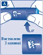 Руки вставляют одноразовую иглу в шприц-ручку, на экране отображена цифра 2, что означает вставлено две единицы