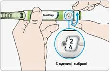 Una mano tiene la penna siringa Somastar, l'altra imposta la dose di 24 unità sul quadrante, un'immagine ingrandita mostra la dose selezionata